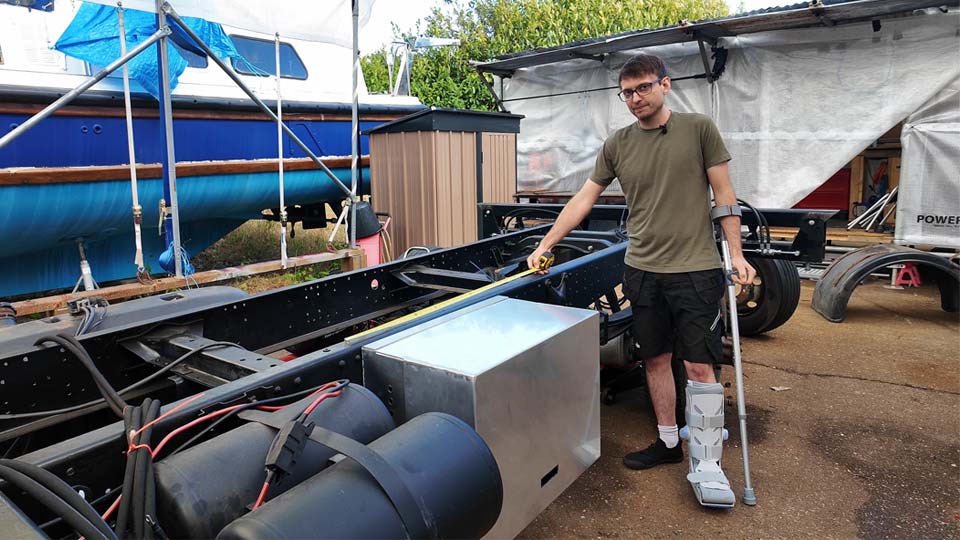 Peter measuring the length of the chassis