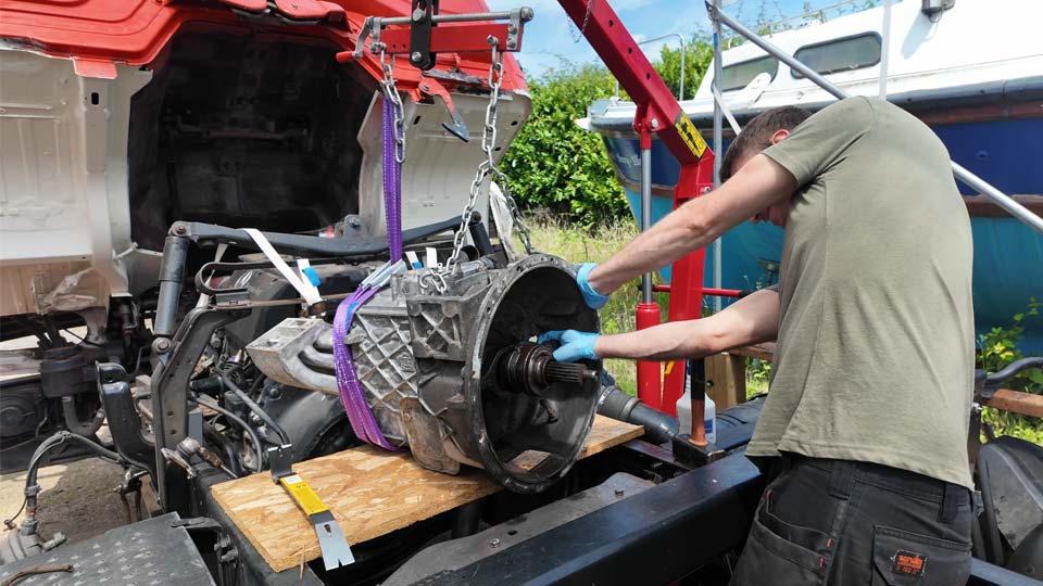 Peter pulling on a seized clutch release bearing