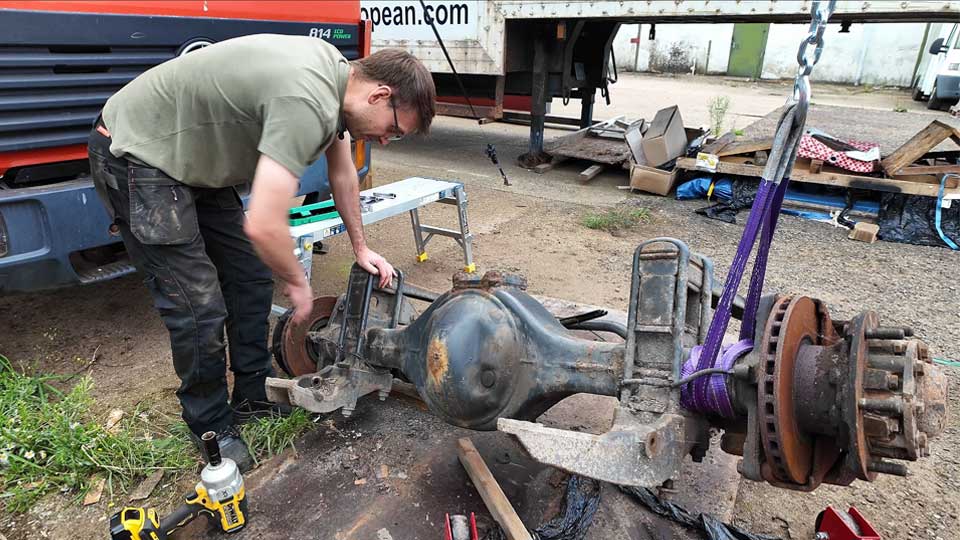Pete lifting our Mercedes 815 Atego donor axle and air suspension parts with an engine hoist