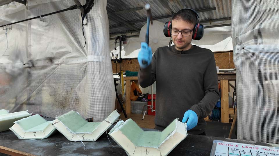 Pete kitting our fibreglass chamfers with a hammer to test the strength