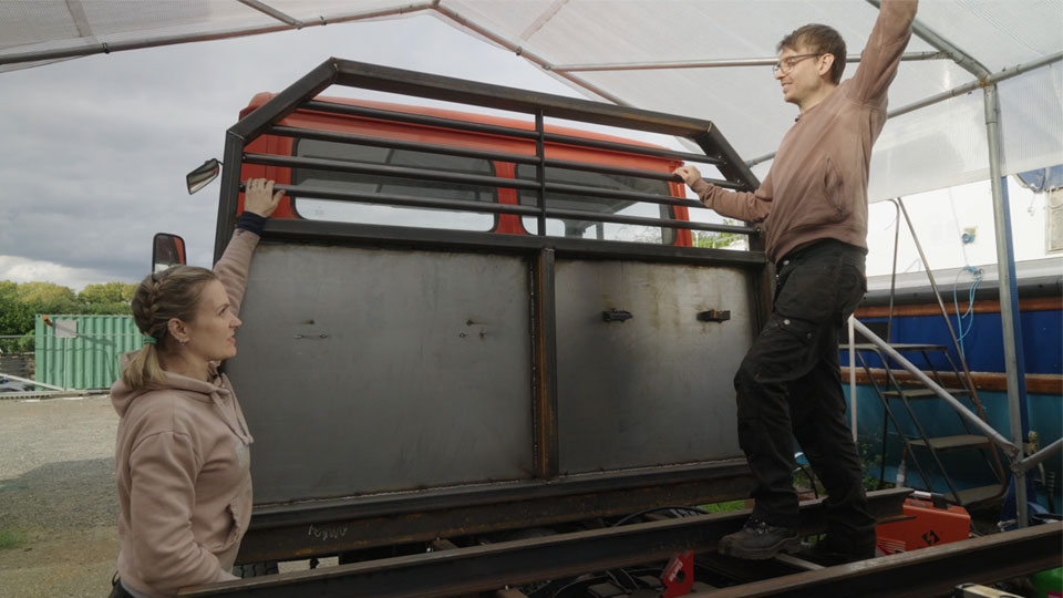 Hayley & Pete showing off their completed custom built bulkhead