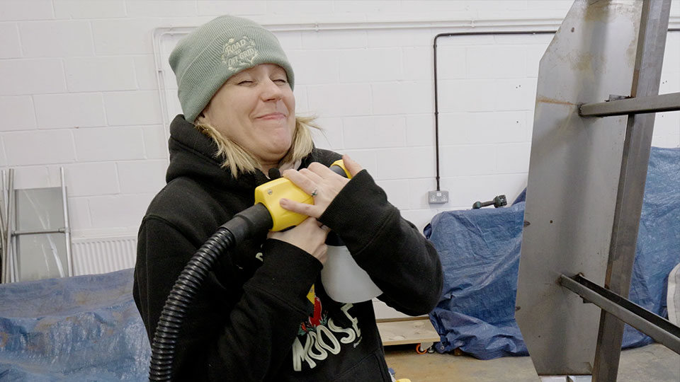 Hayley and her paint sprayer